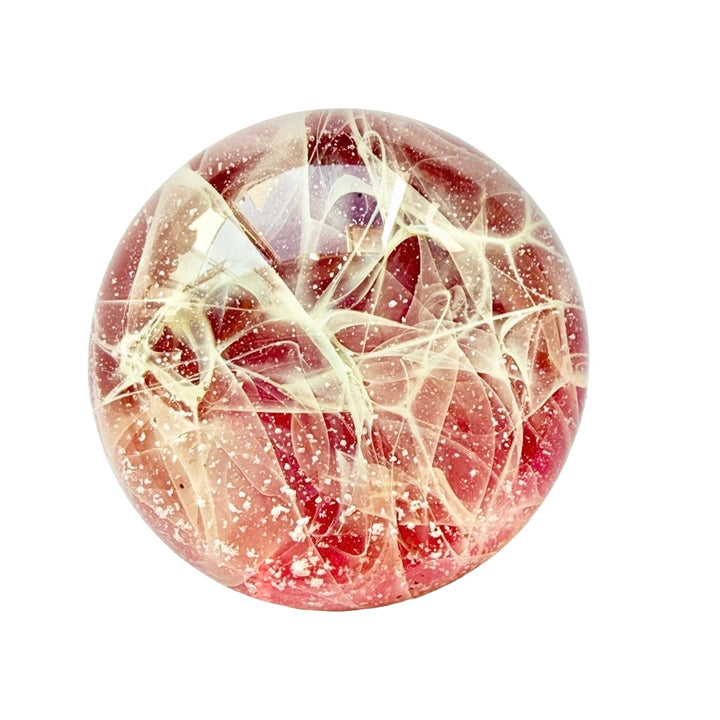 pik round glass with wispy lines and cremation ash showing 